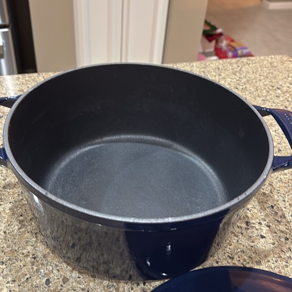 Made In cast-iron Dutch oven. Never used
 - Picture 2 of 2